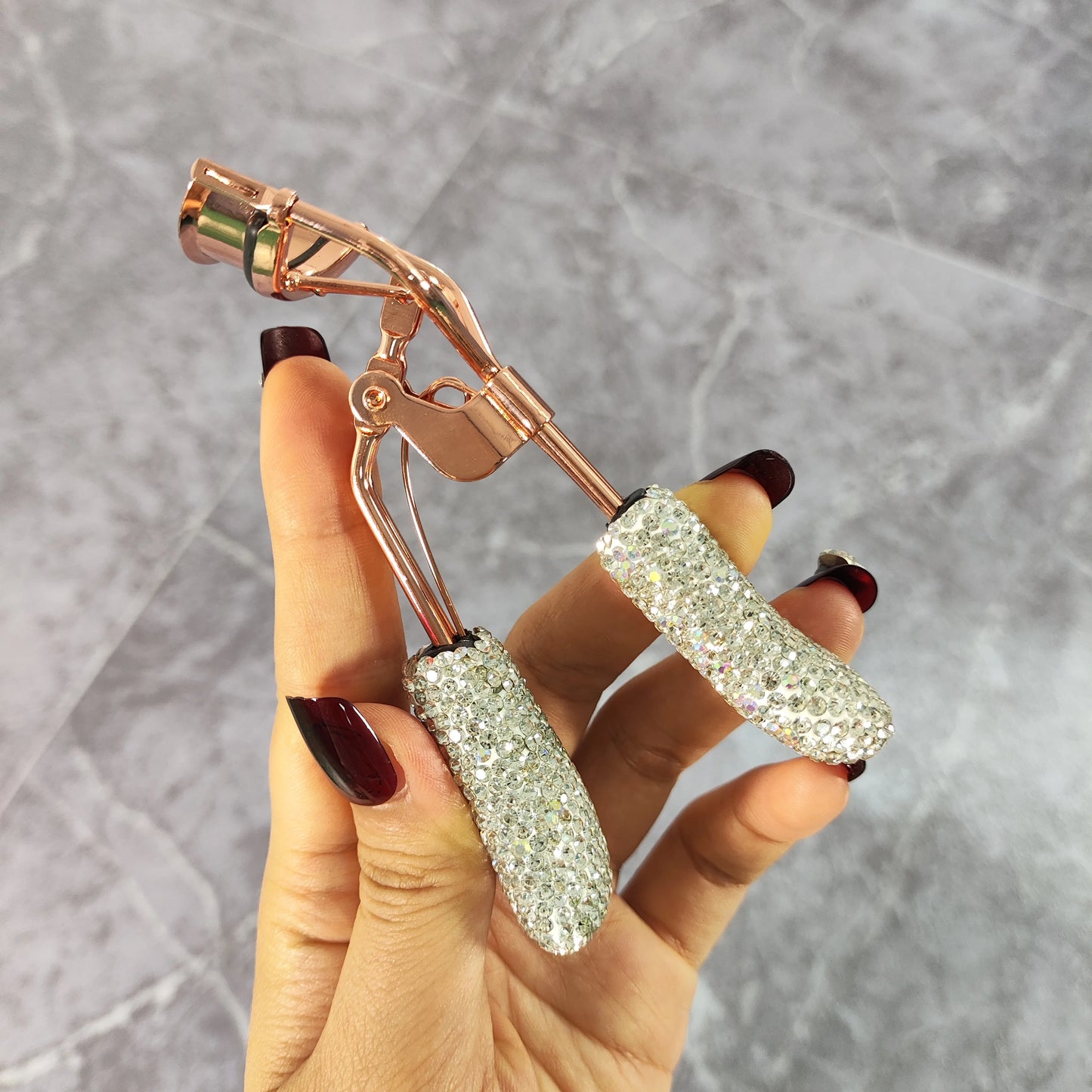 Eyelash curler with artificial diamonds