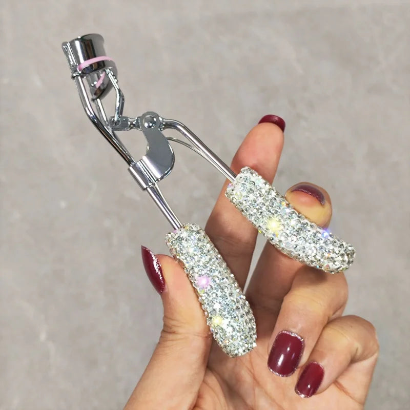 Eyelash curler with artificial diamonds