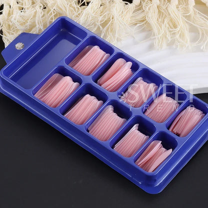 Set of 100 Nude Pink False Nails.
