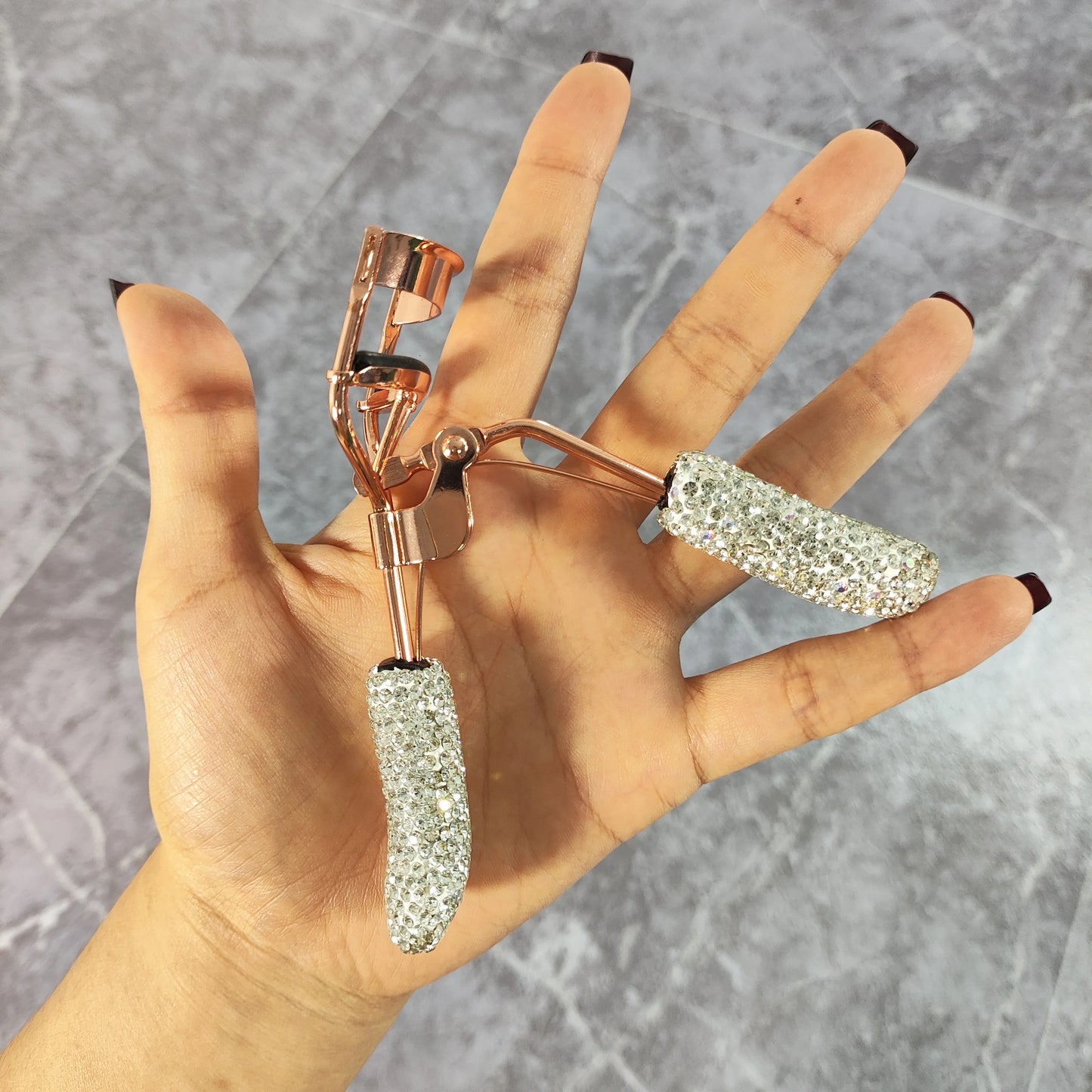Eyelash curler with artificial diamonds