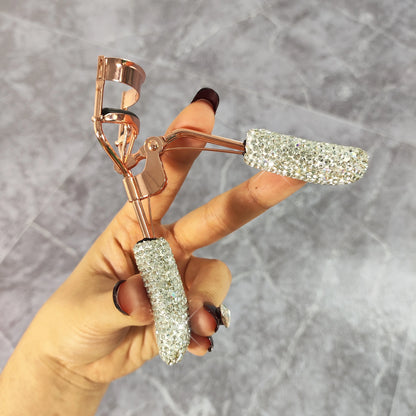 Eyelash curler with artificial diamonds