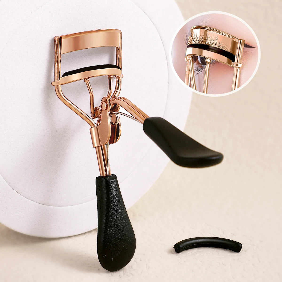 Portable Eyelash Curler.